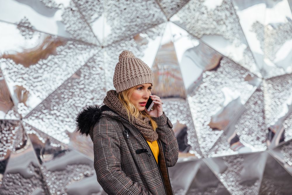 Young woman talking on the phone