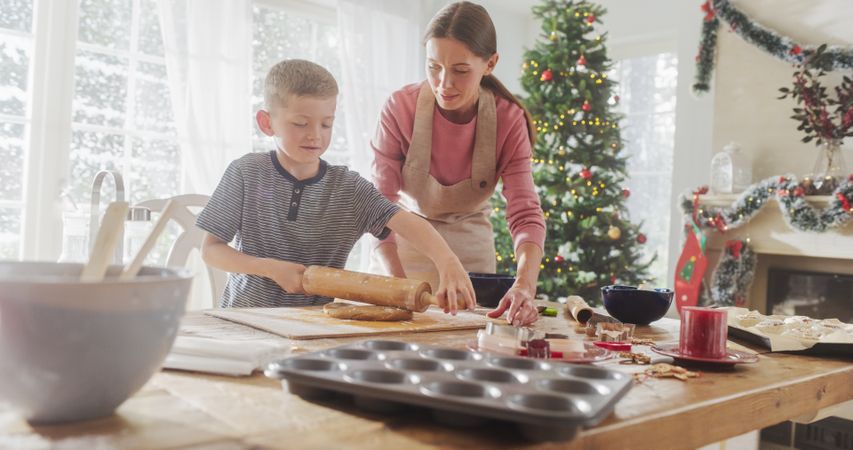 Portrait of Mother and Son Preparing for Baking Gingerbread on Christmas.