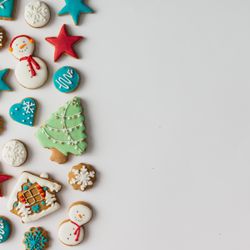 Pattern of Christmas cookies and red berries