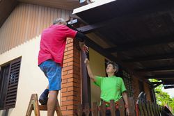 Teamwork in Action: Mature couple working on their home.