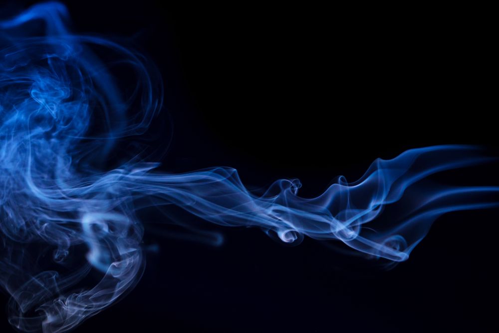 Colorful smoke on dark background