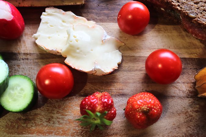 Close view on a healthy german breakfast with sandwiches, tomatoes and cucumbers