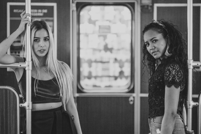 Cheerful friends in train car