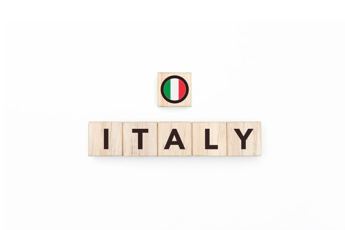 Wooden blocks bearing the name and flag of Italy.