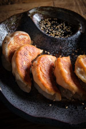 A typical Chinese dumpling that is very popular in China, Japan and Korea, as well as outside Asia. Jiaozi are stuffed with minced meat or vegetables and rolled into a thin, thin dough, which is usually sealed with the fingers.