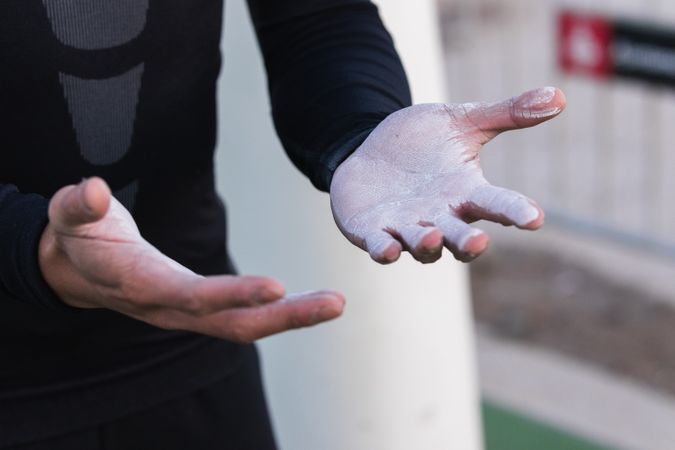 Athletic man with powdered hands