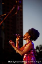 Los Angeles, CA, USA - July 12, 2012: Side view of Nailah Porter singing 5nZJ25