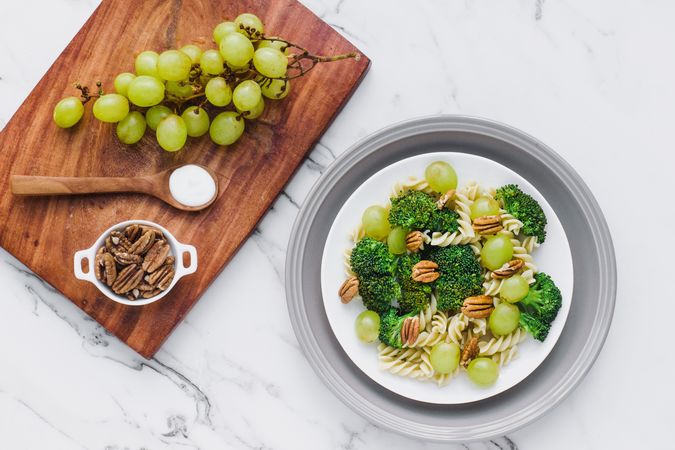 Bowl of cut chicken broccoli macaroni and cheese