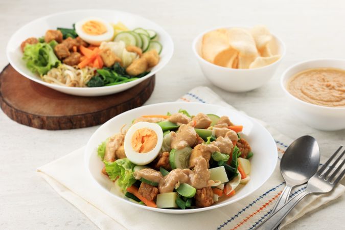 Gado Gado Indonesian Mix Salad from Boiled or Steam Vegetable Served with Peanut Sauce.