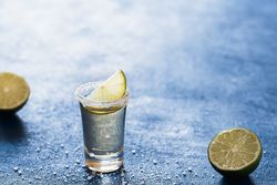 Shot of tequila with salt and lime