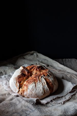 Country sourdough bread on wood