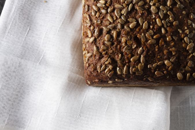 Loaf of bread with grains and poppy seeds