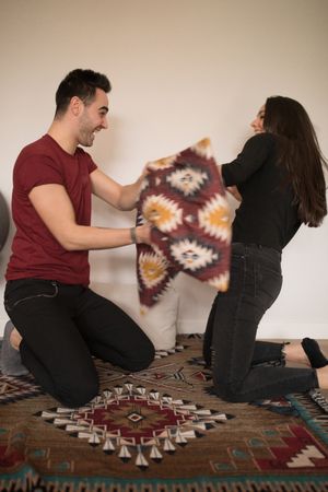 Adult couple having fun at home