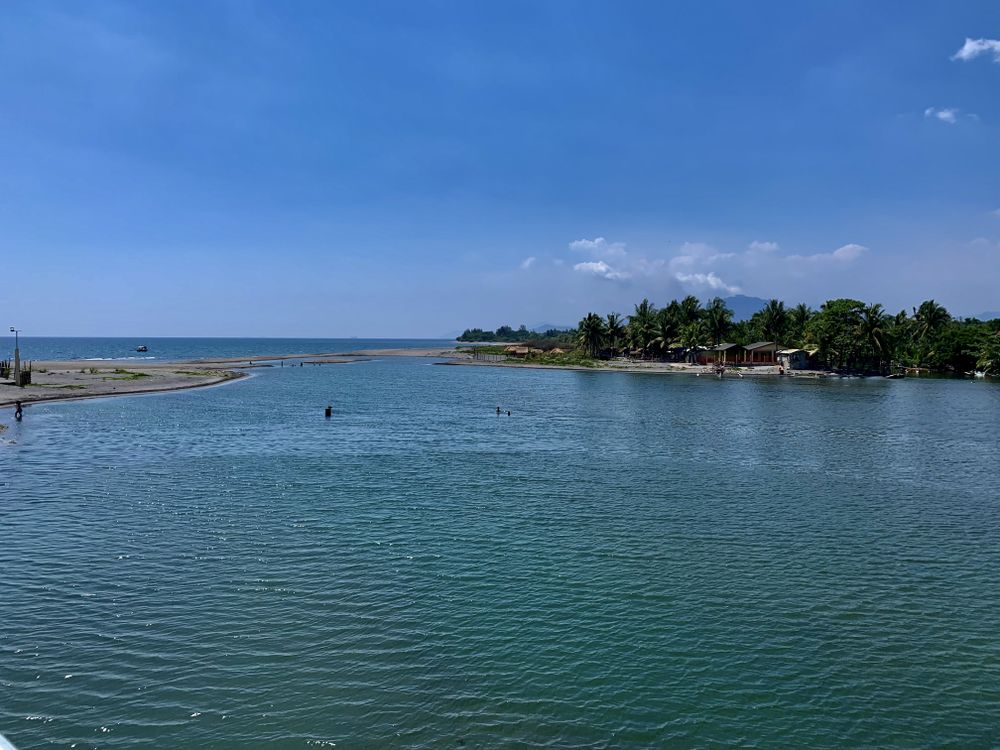beach and river view with blue sky