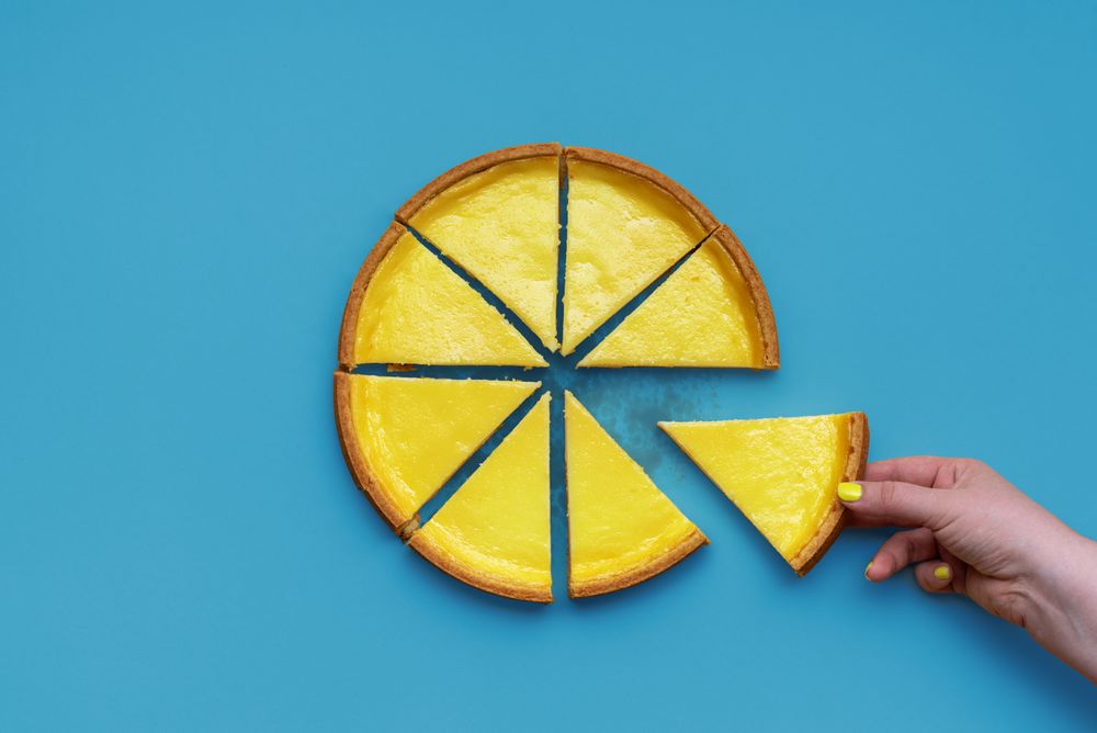 Cheesecake top view isolated on a blue background