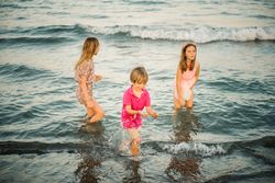 Kids playing in shallow water