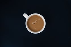 Flat lay of a ceramc cup of coffee