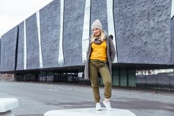 Blonde woman posing in the city