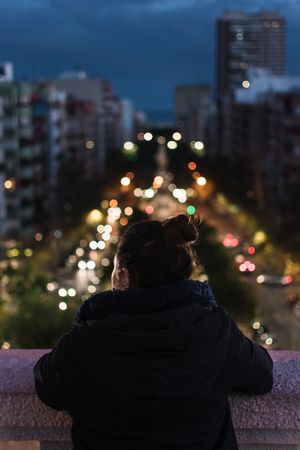 Female tourist enjoying view of ancient town