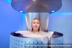 Blonde woman in cryotherapy chamber bYqeYj