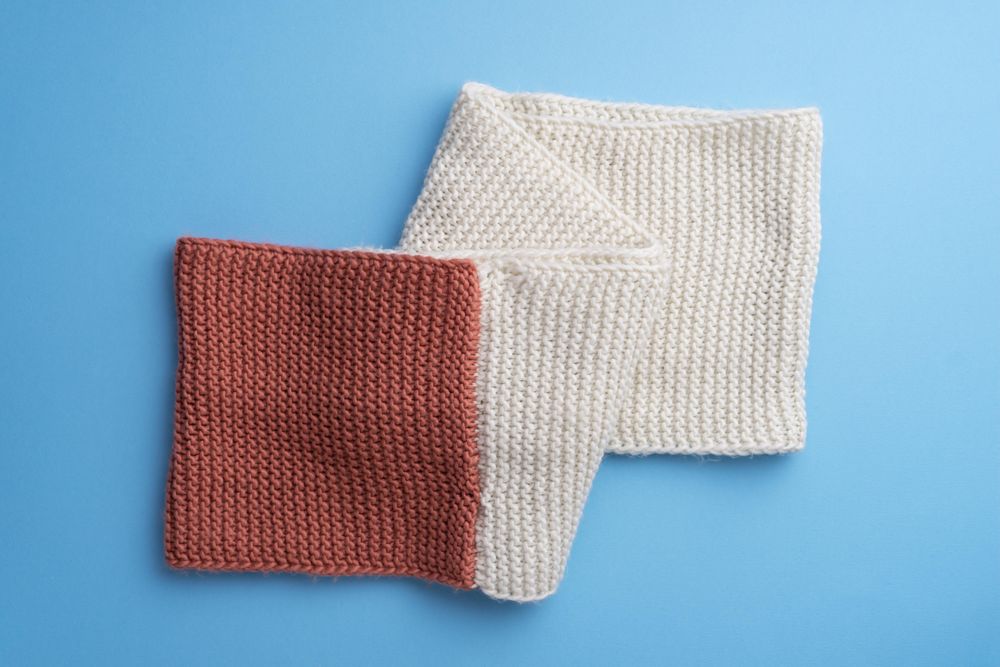 Cream and pink scarf over blue background