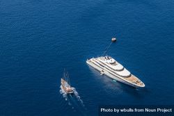 High view of yacht and small boat in the sea 48DqY4