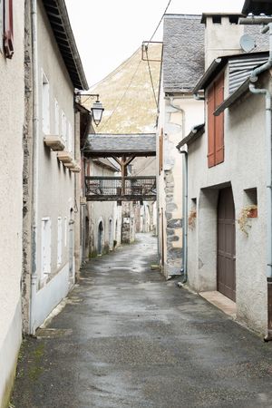 Old buildings in city near mountains