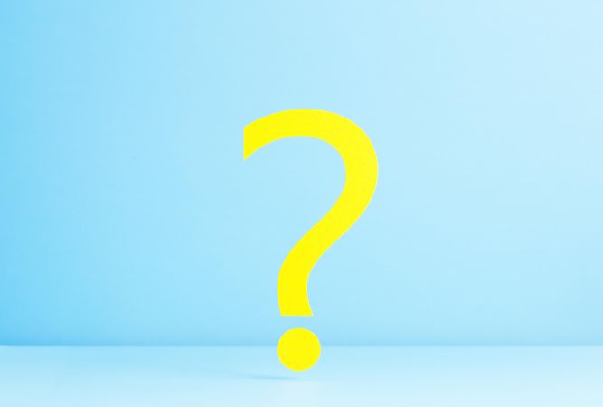 Yellow question mark on blue background