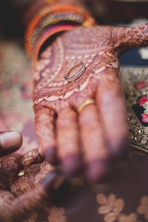 Henna tattooed bride's hand