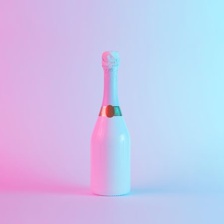 Champagne bottle with colorful ultraviolet holographic neon lights