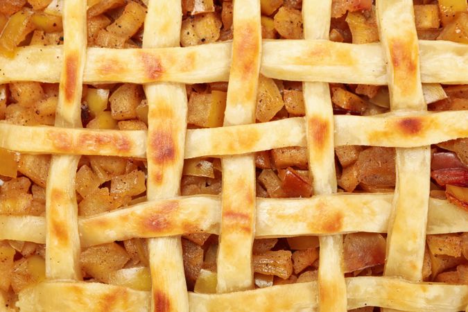 Tasty apple pie on whole background, close up. Homemade food