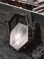 Metal mold with vice grip in workshop