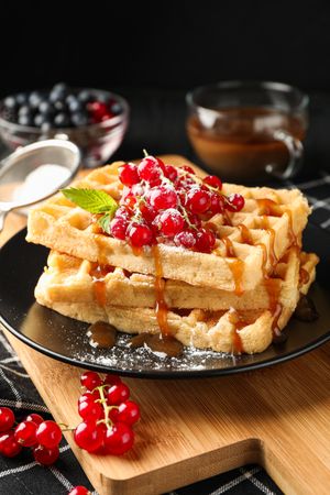 Beautiful composition with sweet waffles, space for text