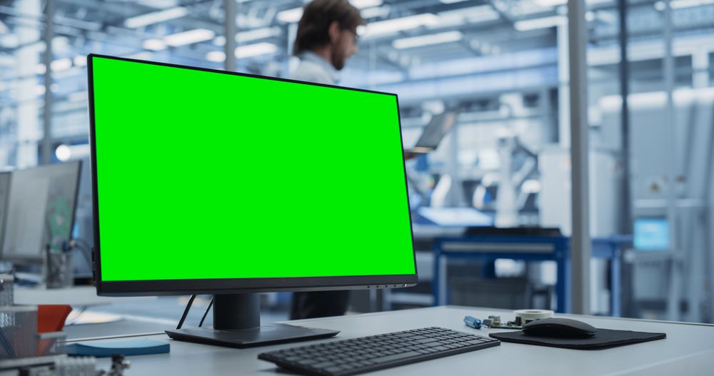 Modern Industrial Manufacture with Desktop Computer with Green Screen Mock Up Display. Scientific Lab, Engineering Research Center with High-Tech Equipment, Technology for Robot Development