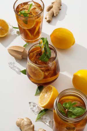 Cold tea with fresh oranges and mint leaves