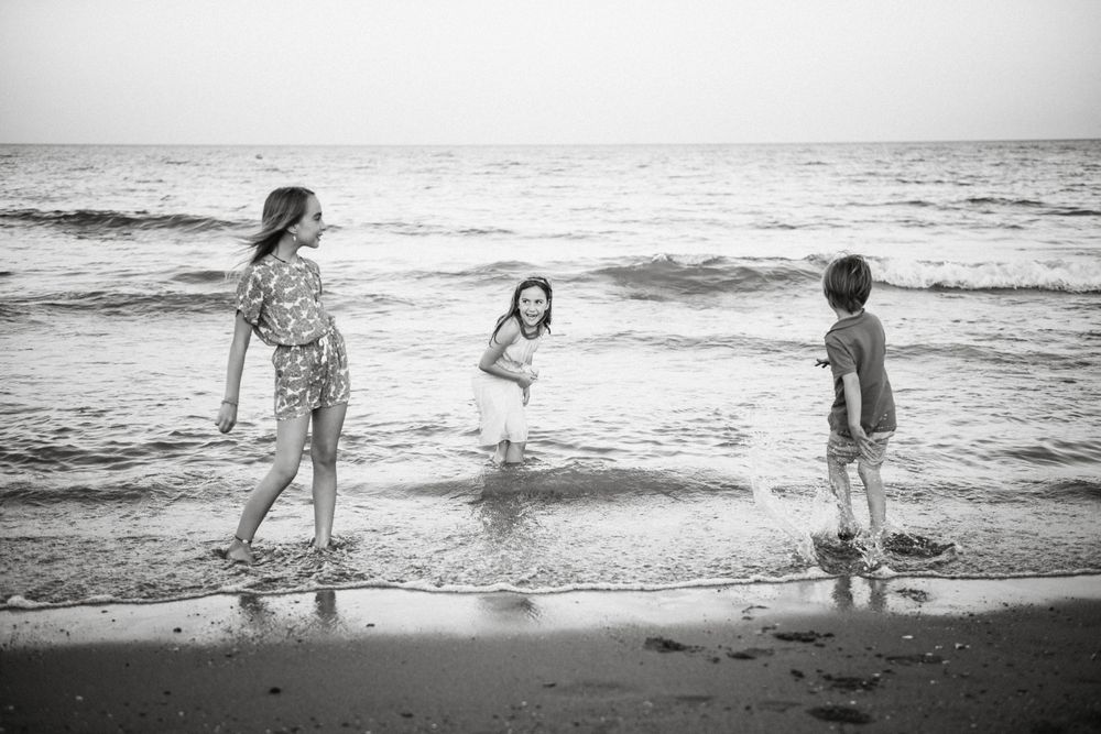 Kids playing in shallow water