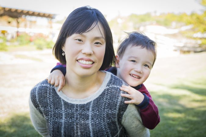 Chinese Mother Having Fun with Her Son