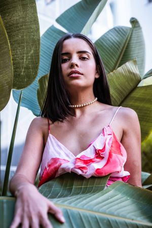 Young trendy woman in garden