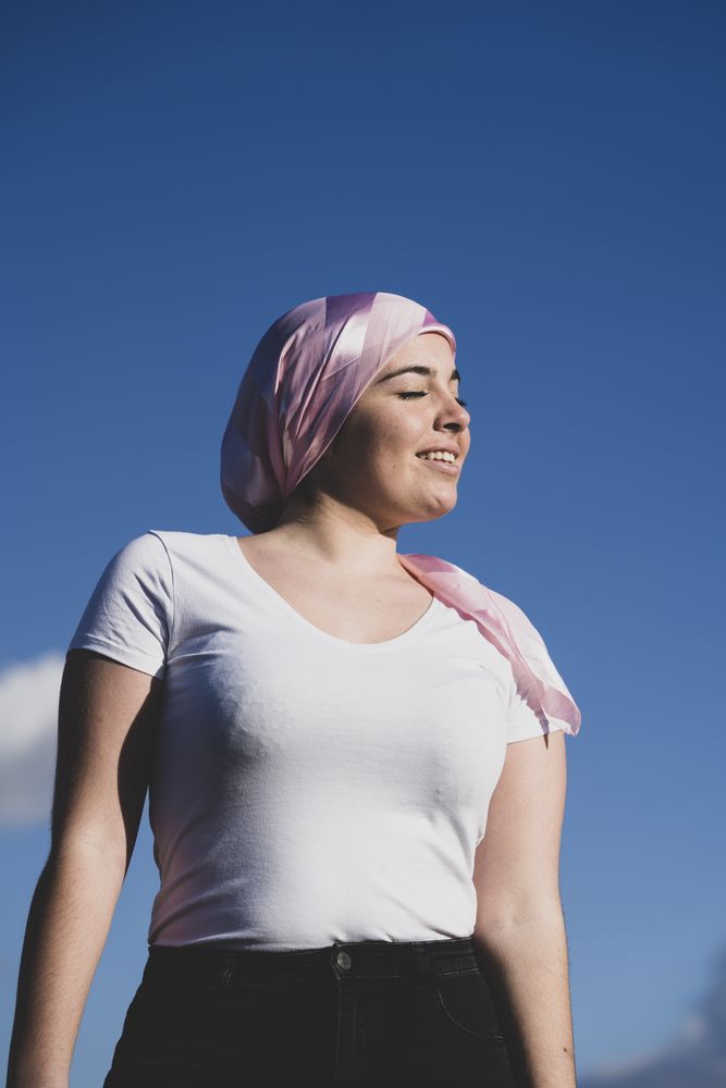 Young woman with cancer wrap