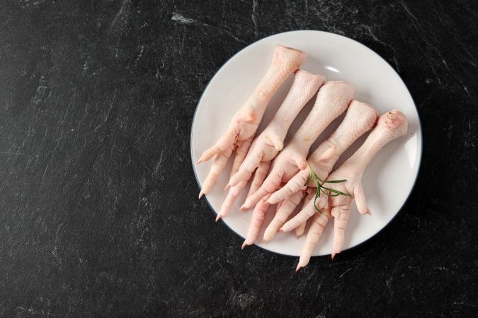 Top View Chicken Feet or Ceker Ayam on Plate