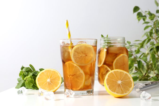 Cold tea with fresh oranges and mint leaves