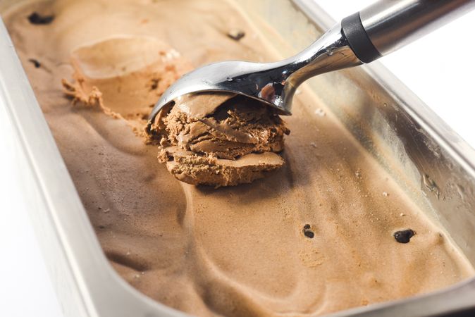 Scooping out chocolate chip ice cream