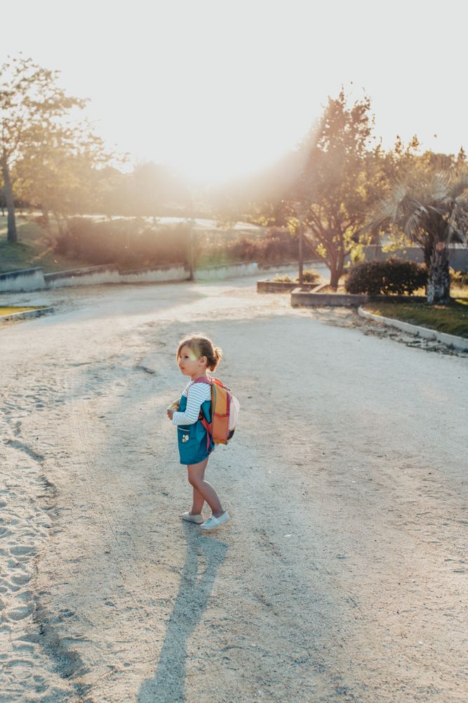 Little girl standing in park