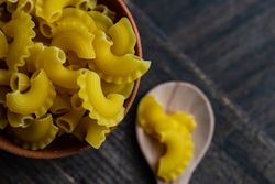 Cooking concept with dry creste pasta