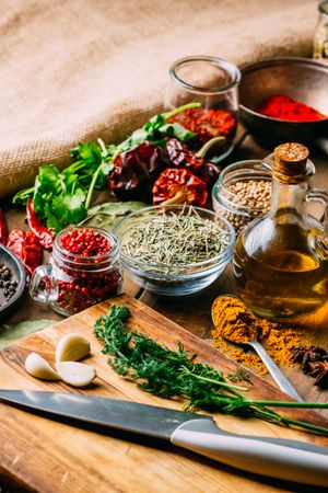 Spices and oil near knife