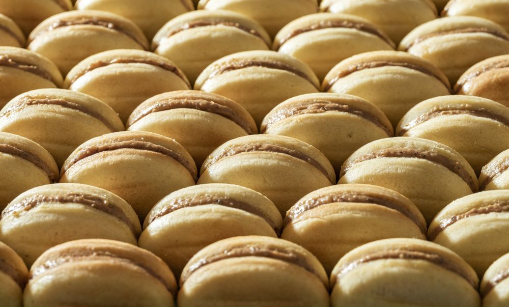 Homemade nut cookies with condensed milk cream filling