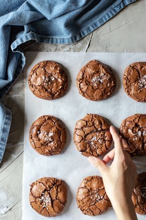 Homemade brownie cookies arranged on baking paper