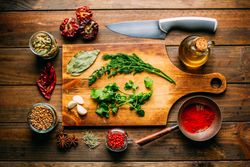 Spices and oil near knife