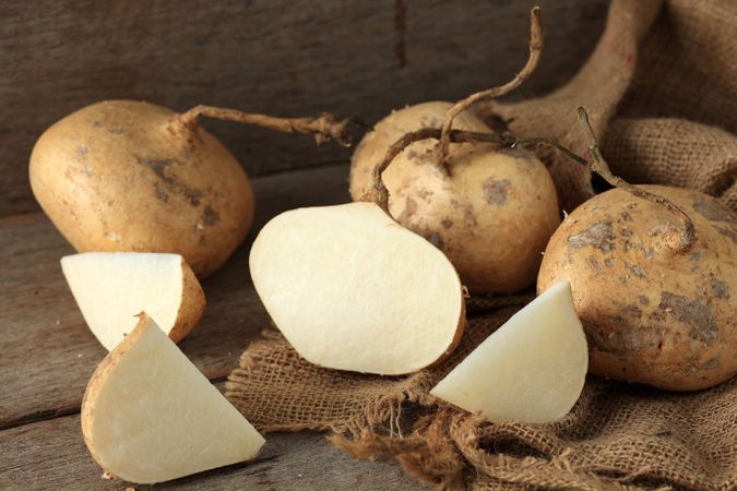 Fresh Jicama or Bengkoang on Rustic Wooden Table