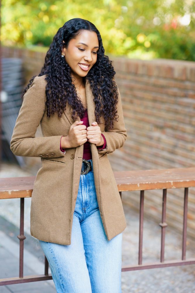 A Stylish and Fashionable Young Woman Embracing Casual Outdoor Fashion with Confidence